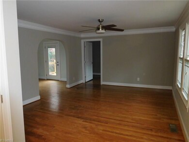 Living room.  Original Hardwood floors on main and second level.  Very spacious room.  There is a half bath located on main level.