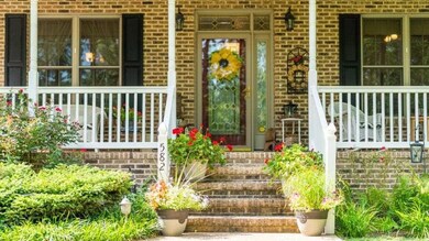 *the front porch is so comfortable and is a great spot for the rocking chairs *the floor is stamped concrete