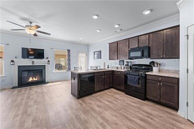 Kitchen featuring light countertops, ornamental mo