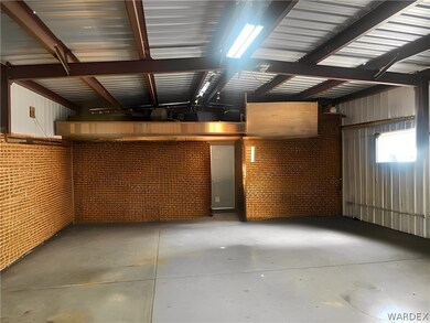 View of garage/ furniture digitally removed - bric