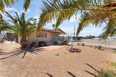 Rear view of property featuring a patio area