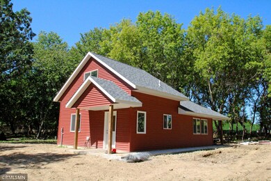 The home is complete with a covered entryway, kitchen, living room, bonus room and covered back porch.