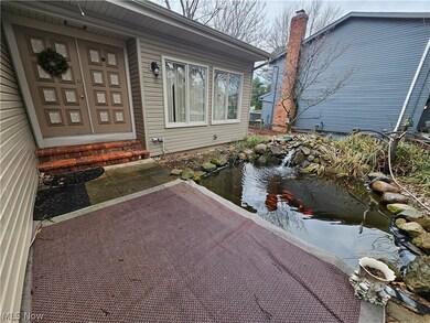 View of front entranceway with pond