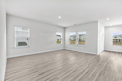 Spare room with light hardwood / wood-style floors