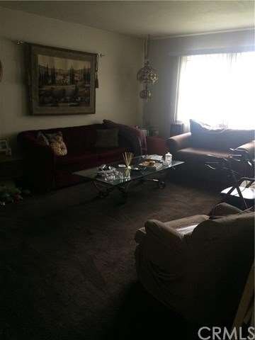Living room with new paint and beautiful thick car