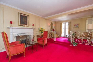 The foyer opens to a spacious 25X25 L-shaped livin