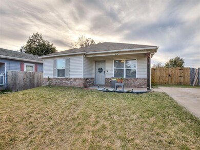 Nicely kept brick and frame home, with nice shutter accents.