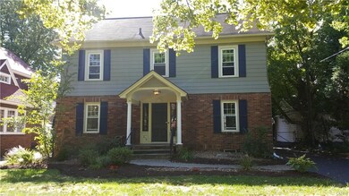 Freshly painted cedar & shutters. Spruced up lands
