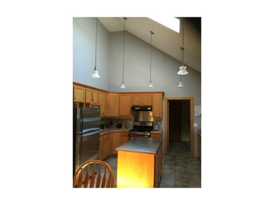 Kitchen with Stainless Steel appliances.