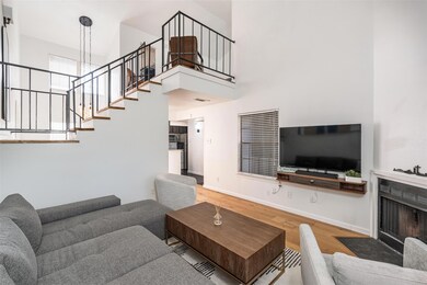 Living room featuring hardwood / wood-style floori