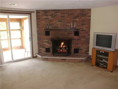 Den/Family/Great Room. Gas Fireplace with Sliders