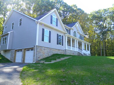 SIDE VIEW W/GARAGES