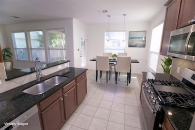 8732 Wood Stork Dr, Austin, TX 78729 - photo 4