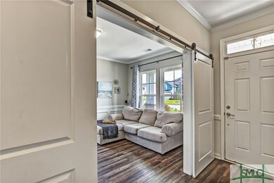 Foyer hallway for entry abundant with crown moldin
