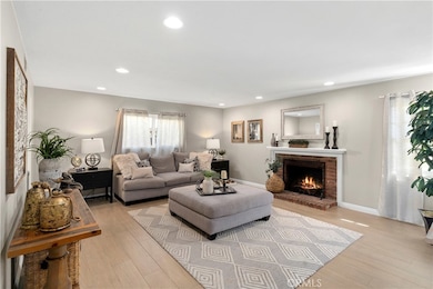 Living Room with Recessed Lighting, Fireplace, Porcelain Tile Floors and so much more. All of this floor plan is usable, no wasted space.