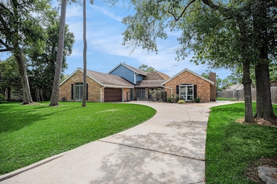 A stunning front elevation featuring a circular dr