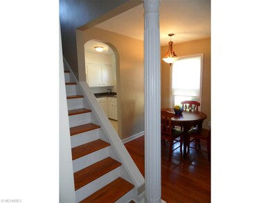 Beautiful staircase opens to dining and living roo
