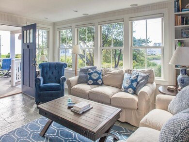 Living room and front deck area