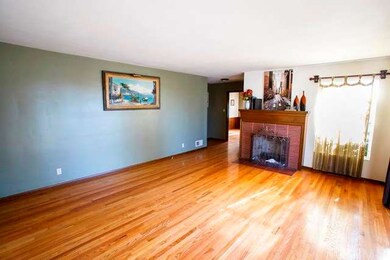  Living Room & Mantled Fireplace