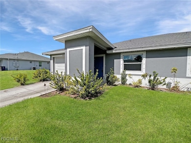 1306 W 12th St, Lehigh Acres, FL 33972 - photo 4