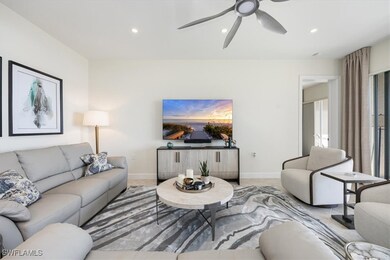 Living room featuring recessed lighting and ceiling fan