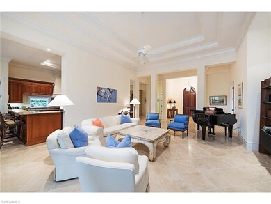 Great room with double tray ceiling and neutral st