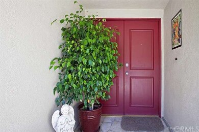 The red door treatment and custom tropical tile in