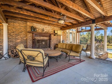 back porch with wood burning fireplace