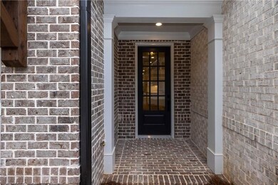 Front porch entry. *Please note the photos shown are representative of the plan but are not of the actual home.