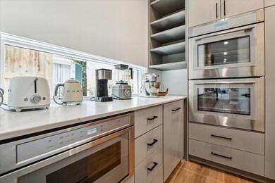 The adjoining scullery offers expanded prep space