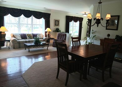 In view of 3 sided gas fireplace with built ins.