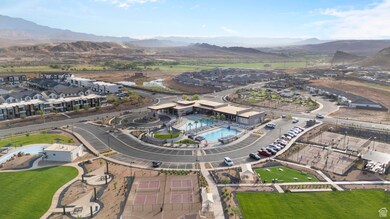 Aerial overview of property's location featuring nearby suburban area