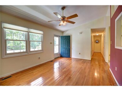 Great Room with Lovely Hardwood Floors throughout 