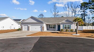 Ranch-style house featuring a garage