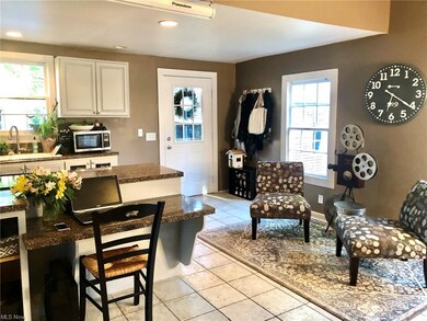 The open concept kitchen blends with a cozy family
