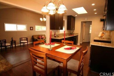Opens to kitchen & family room