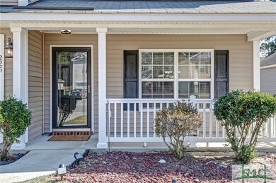 ENJOY A BEVERAGE ON THE COVERED FRONT PORCH