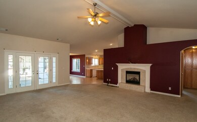 Living Room to Patio and Kitchen
