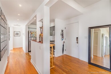 Front door, hallway to kitchen and main bedroom