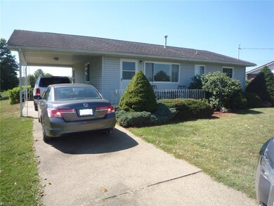 Attached carport with access to the front door and
