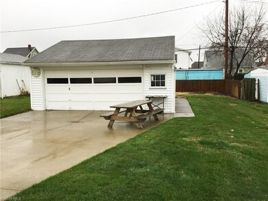 Large 2 car garage with ample storage and a nice s