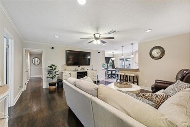 From the foyer, into the den!  Recessed lighting,