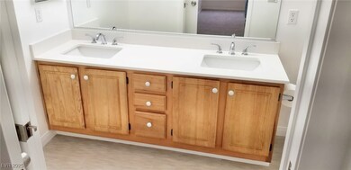 Bathroom featuring double vanity