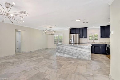 Custom Kitchen with marble counters, marble floors