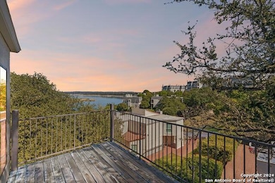 Deck at dusk with a water view