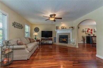 Open family room with cozy fireplace.