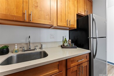 Kitchen cabinets extend to ceiling