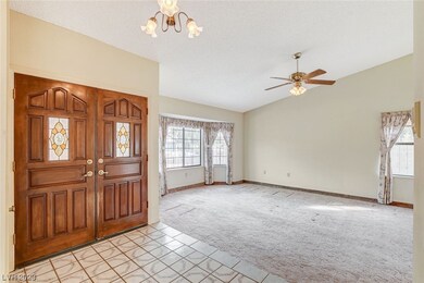 View of sunken living room from entry way.
