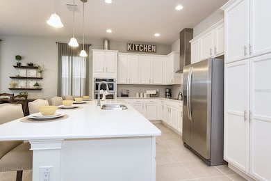 7736 Linkside Loop, Reunion, FL 34747 - photo 3