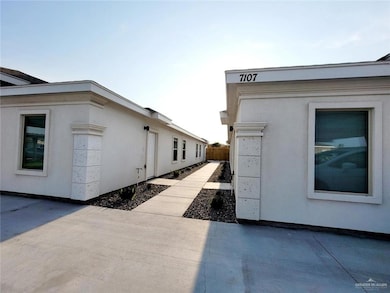 View of home's exterior with a patio area and stucco siding